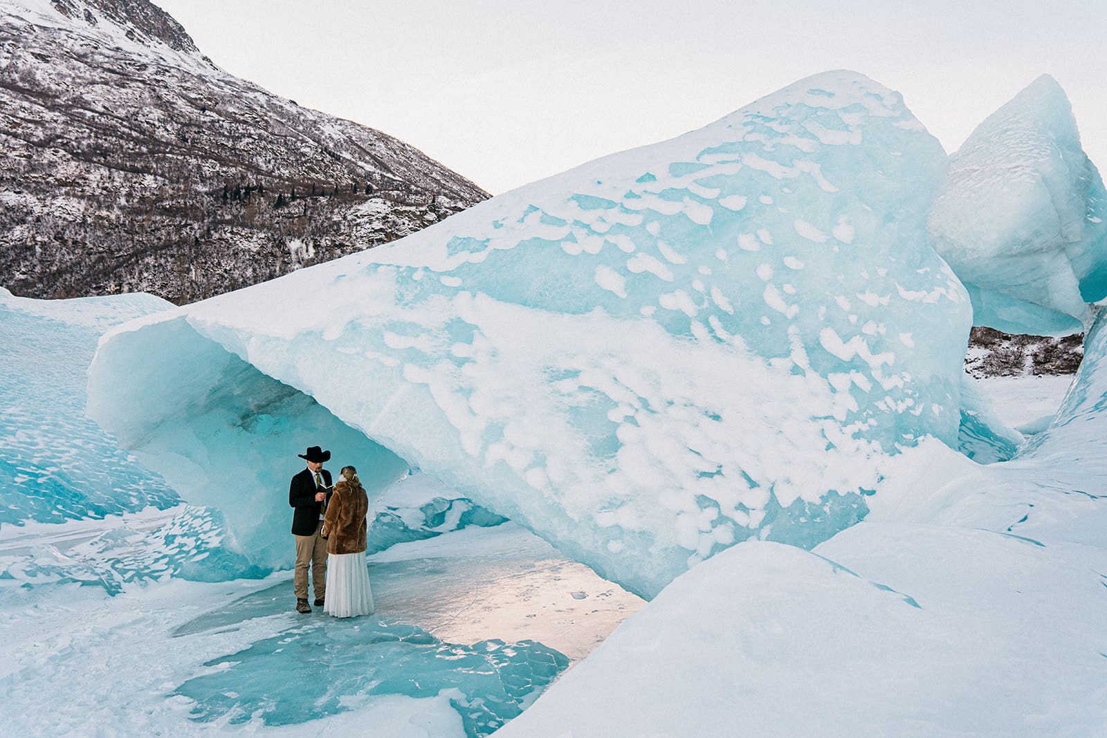 The knik glacier in winter with eloping couple