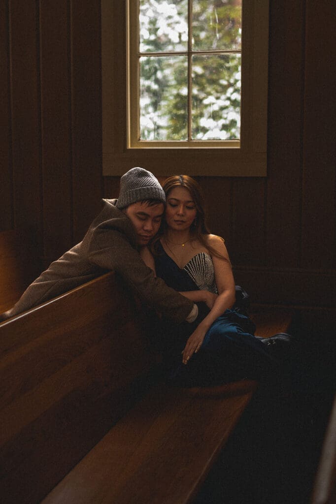 Couple has quiet moment in chapel in yosemite