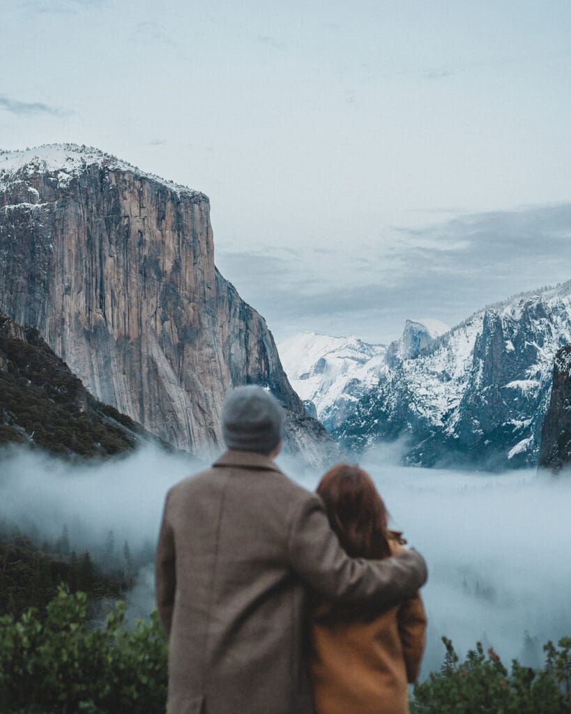 Yosemite engagement photos Tunnel View winter couple overlooking valley