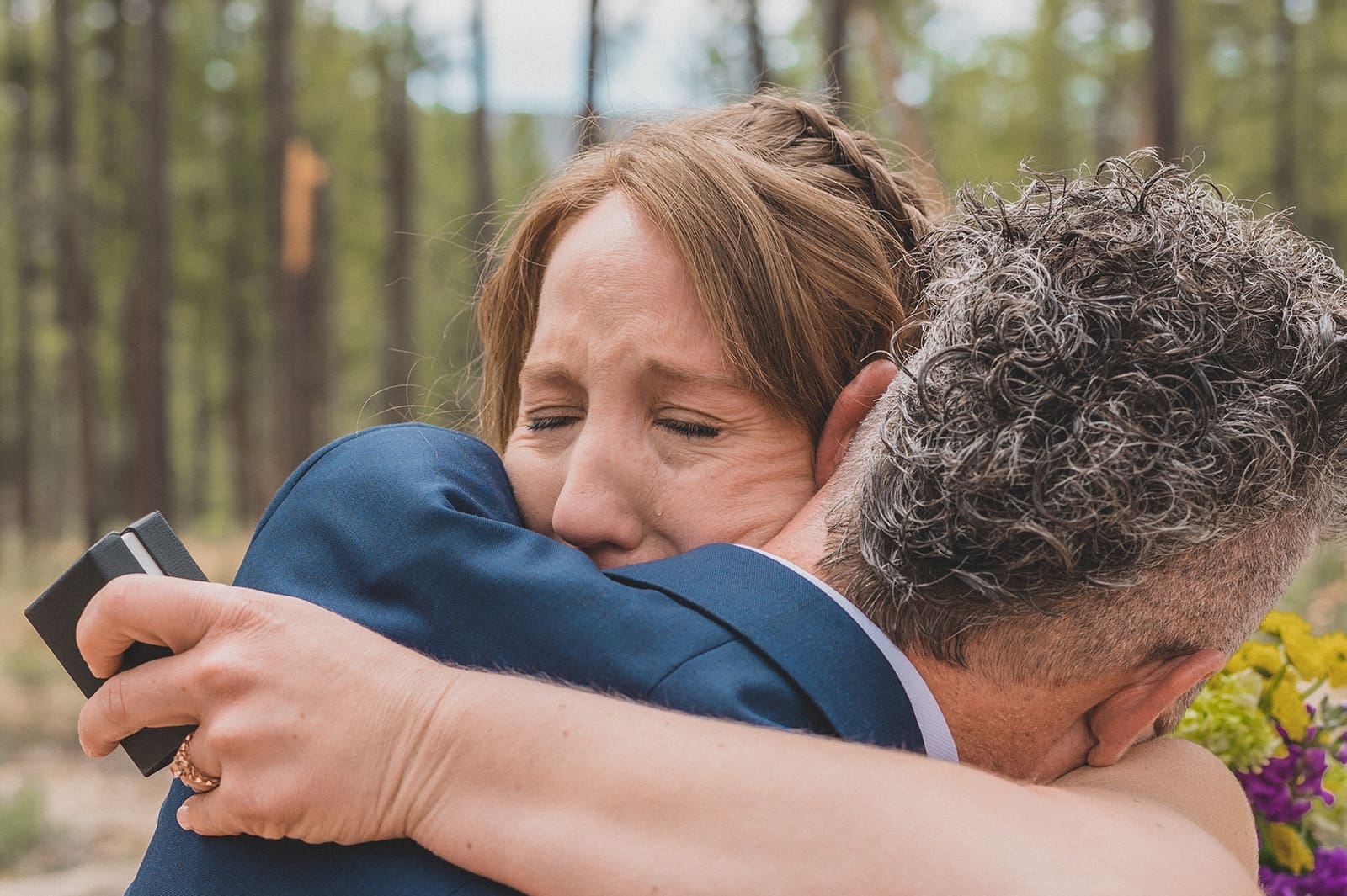 emotional moment between bride and groom
