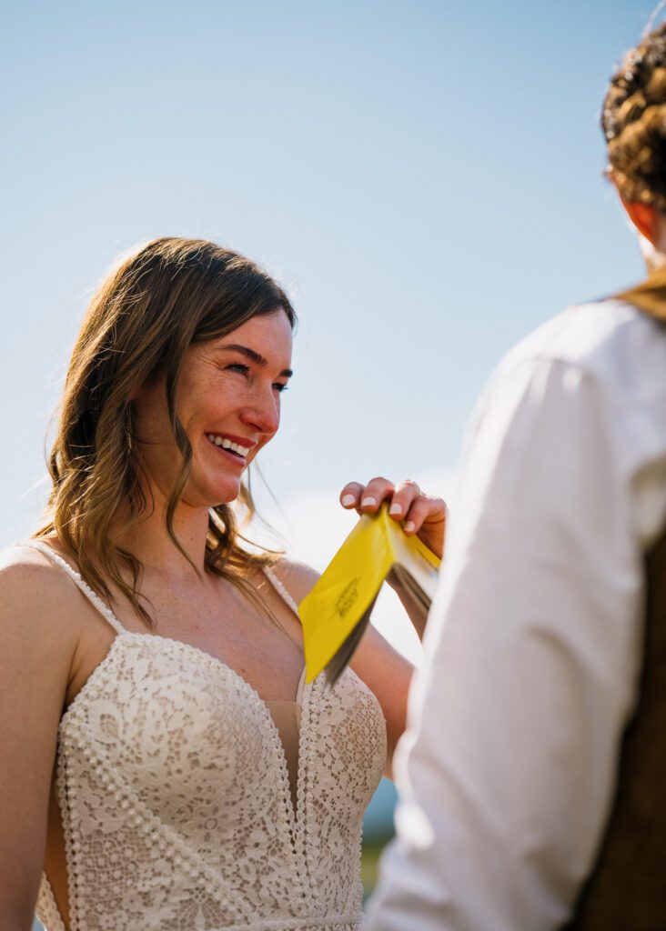 Bride smiling at her groom during their Alaska elopement