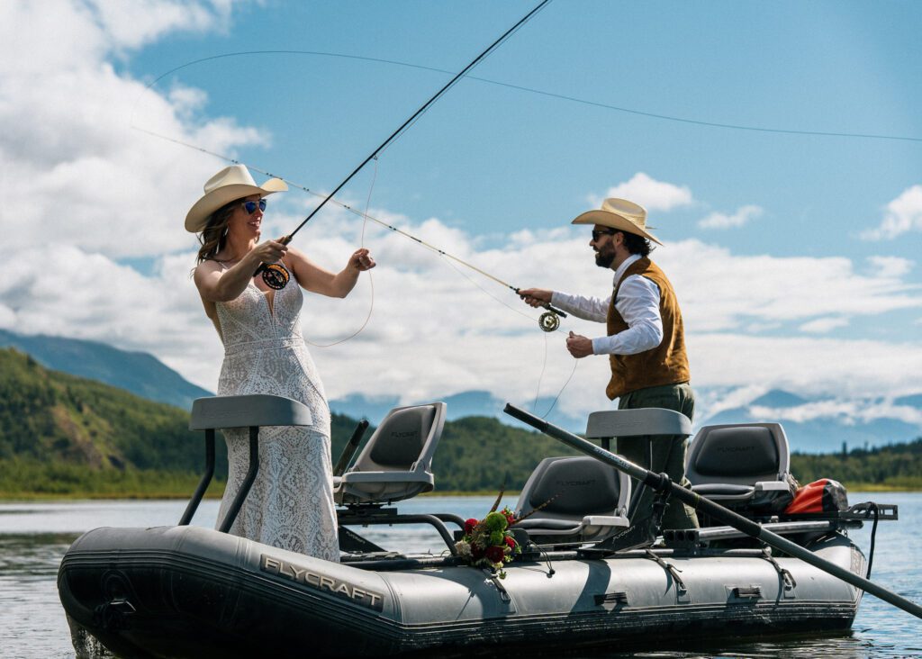 Bride and groom fishing together during their Alaska elopement